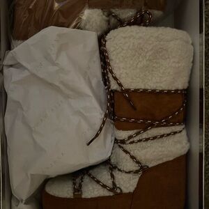 Avery Waxy Brown and White Shearling Boots